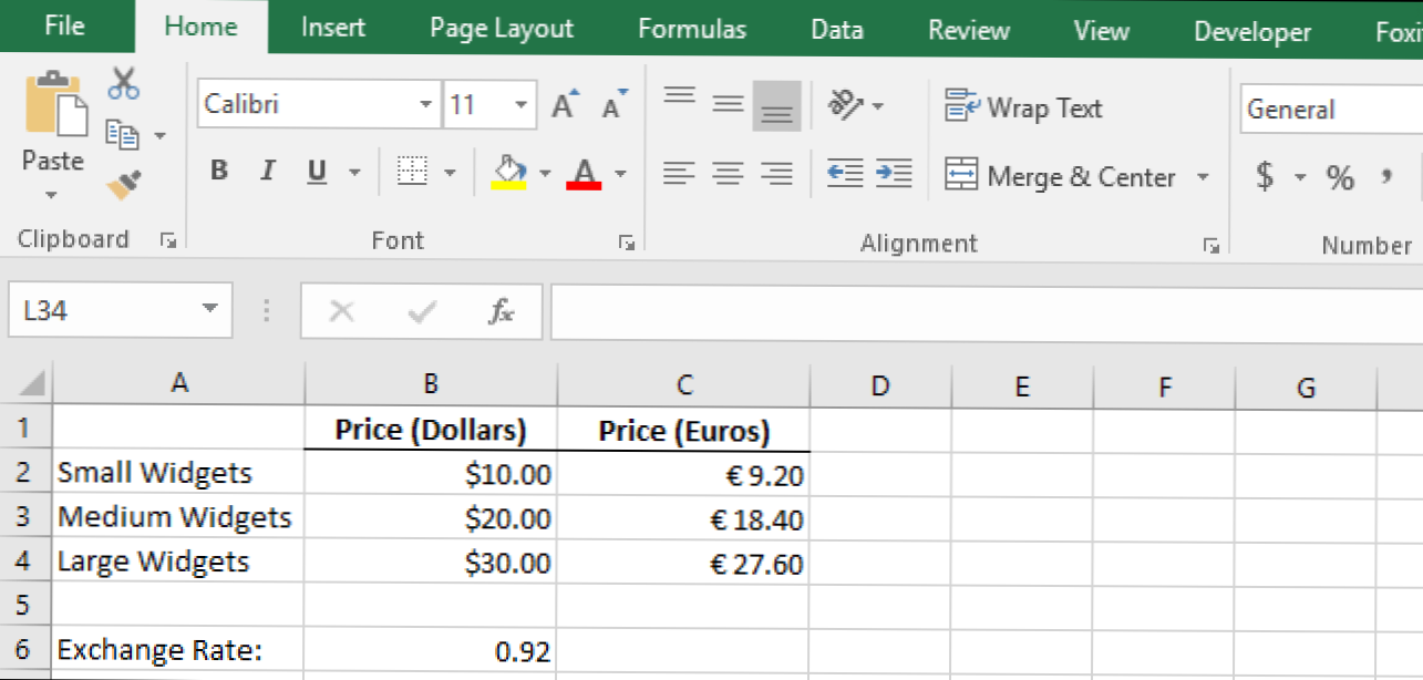 Kako promijeniti simbol valute za određene ćelije u programu Excel (Kako da)